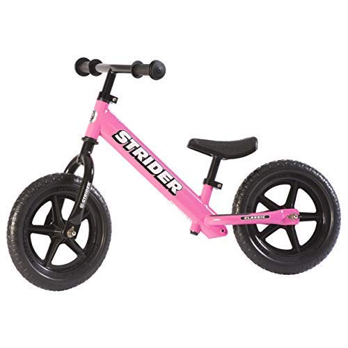 Product Cover Strider - 12 Classic No-Pedal Balance Bike, Ages 18 Months to 3 Years, Pink