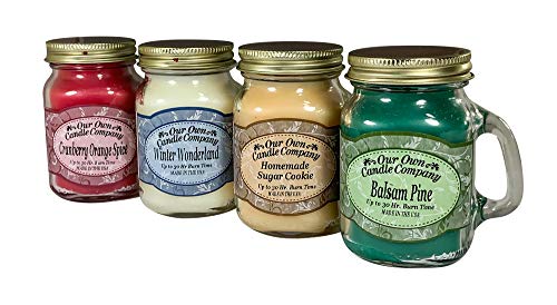 Product Cover Our Own Candle Company 4 Pack Christmas Assortment Mini Mason Jar Candles - 3.5 Oz Balsam Pine, 3.5 Oz Cranberry Orange Spice, 3.5 Oz Homemade Sugar Cookie, 3.5 Oz Winter Wonderland