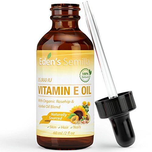 Product Cover 100% Natural Vitamin E Oil 35,000 IU + Organic Rosehip & Jojoba Blend - 2 OZ Bottle. FAST Absorbing Skin Protection For Face & Body. Pure Ingredients - Ideal For Sensitive Skin - Use Daily