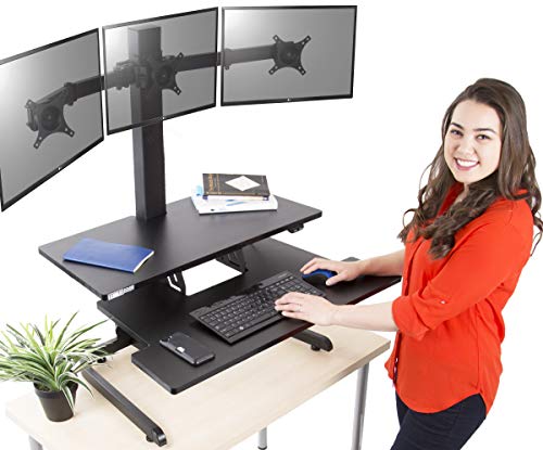 Product Cover Stand Steady Techtonic Electric 3 Arm Monitor Mount Standing Desk | Large Spacious Stand Up Desk | Easy Sit to Stand with The Push of a Button - Quiet! | 3 Levels to Maximize Your Space!