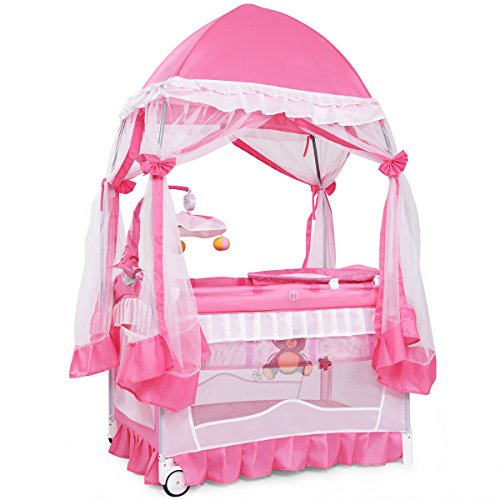 Product Cover BABY JOY Portable Playard, 4 in 1 Convertible Baby Playpen with Changing Table, Mesh Net, Foldable Bassinet Bed with Music Box, Cute Whirling Toys, Wheels & Brake, Oxford Carry Bag, Pink (32 in)